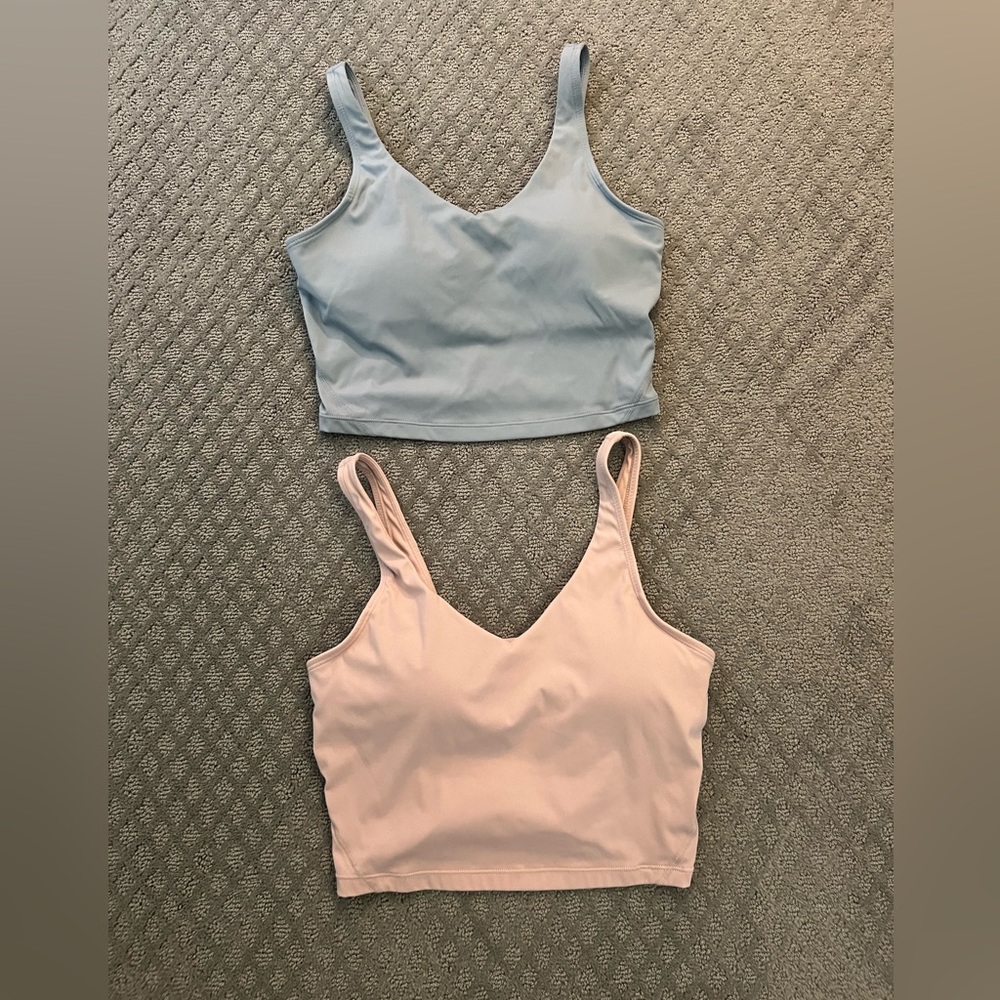 2 un-branded padded sports bras